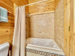 Guest bathroom with tiled shower/jacuzzi